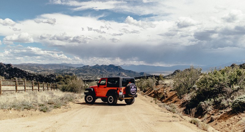 Jeep parked on a scenic Colorado backcountry road